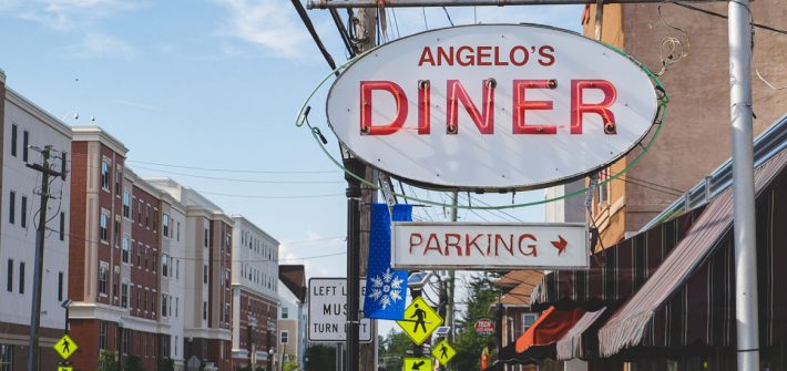 External shot of Angelo's Diner and Main St.