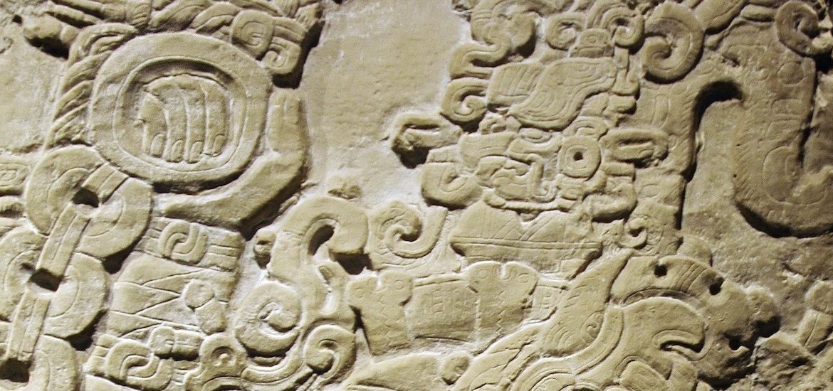 A close up of Mexican communication on a stone from an ancient civilization.